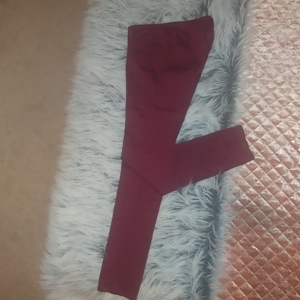 Full length red skinny jeans